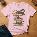 Retro Black Cats Mahjong Shirt in Blossom - folded tee, three black cats over a row of mahjong tiles with arched MAHJONG lettering