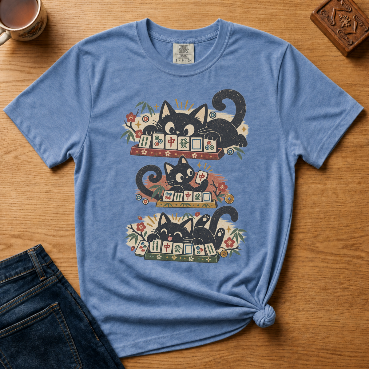 Retro Black Cats Mahjong Shirt in Jean Blue - three black cats over a row of mahjong tiles with arched MAHJONG lettering