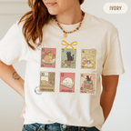 Model wearing a relaxed unisex Ivory shirt featuring vintage postage-stamp cats with books.