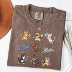 Espresso graphic T-shirt with nine cartoon cats playing pickleball