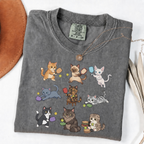 Pepper graphic T-shirt with nine cartoon cats playing pickleball