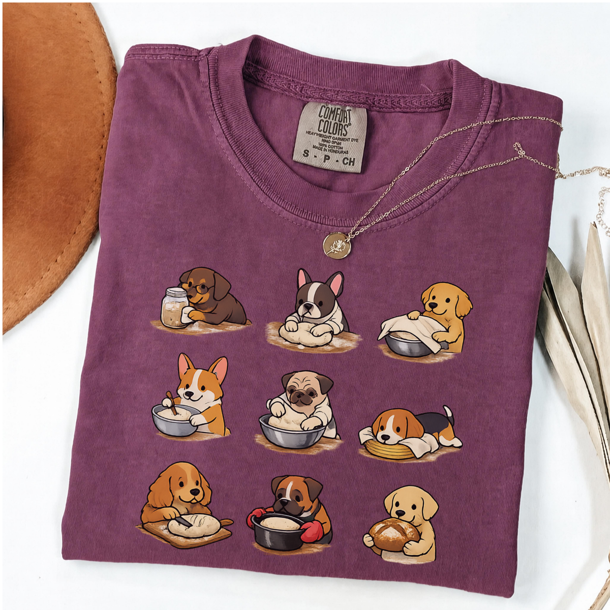 Berry Comfort Colors shirt featuring nine adorable dogs baking and preparing bread