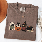Espresso Comfort Colors Halloween shirt featuring four black cats reading books in spooky costumes