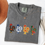 Pepper garment-dyed T-shirt featuring four colorful Portuguese folk-art roosters in a row