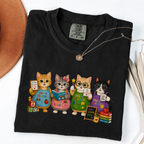 Black T-shirt with four cartoon cats dressed as colorful pre-K teachers.