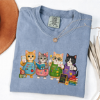 Blue Jean T-shirt with four cartoon cats dressed as colorful pre-K teachers.