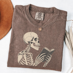 Espresso Comfort Colors book lover shirt featuring a vintage skeleton reading